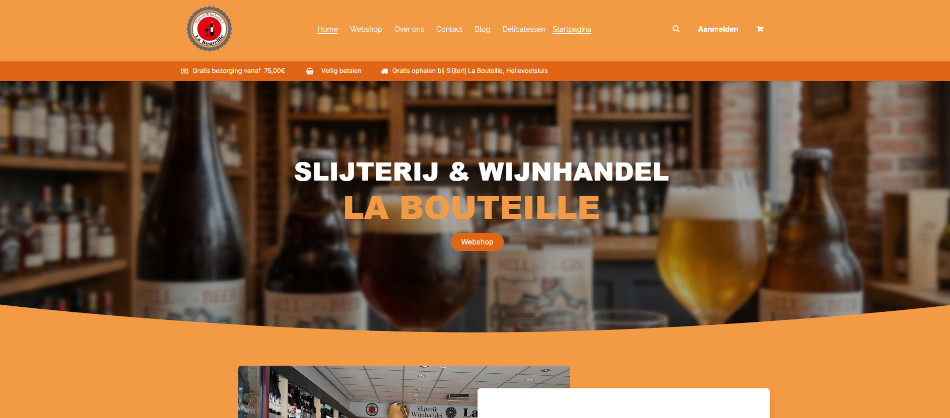Desktopmonitor toont de webshop en drankenomgeving van La Bouteille op een witte achtergrond. Odoo integratie van winkel, webshop en administratie voor Groots Dranken door Newconomie